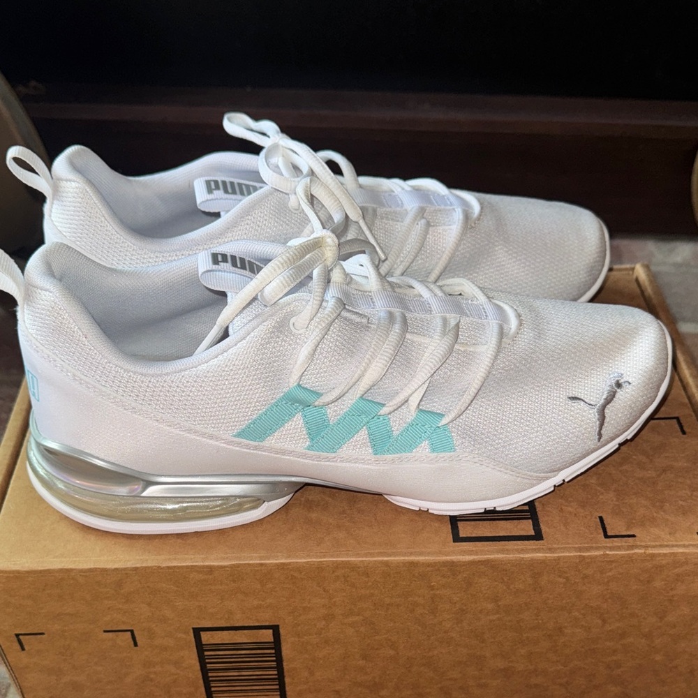 Puma size 10 women’s prowl running  White Sneakers with Aqua Highlights